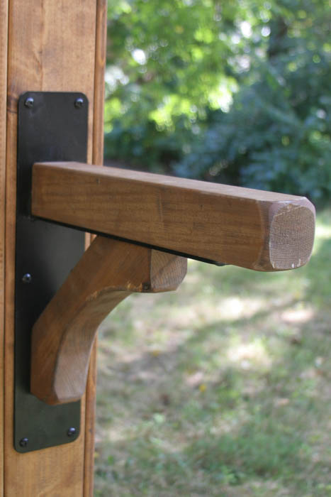black mailbox bracket with cedar trim